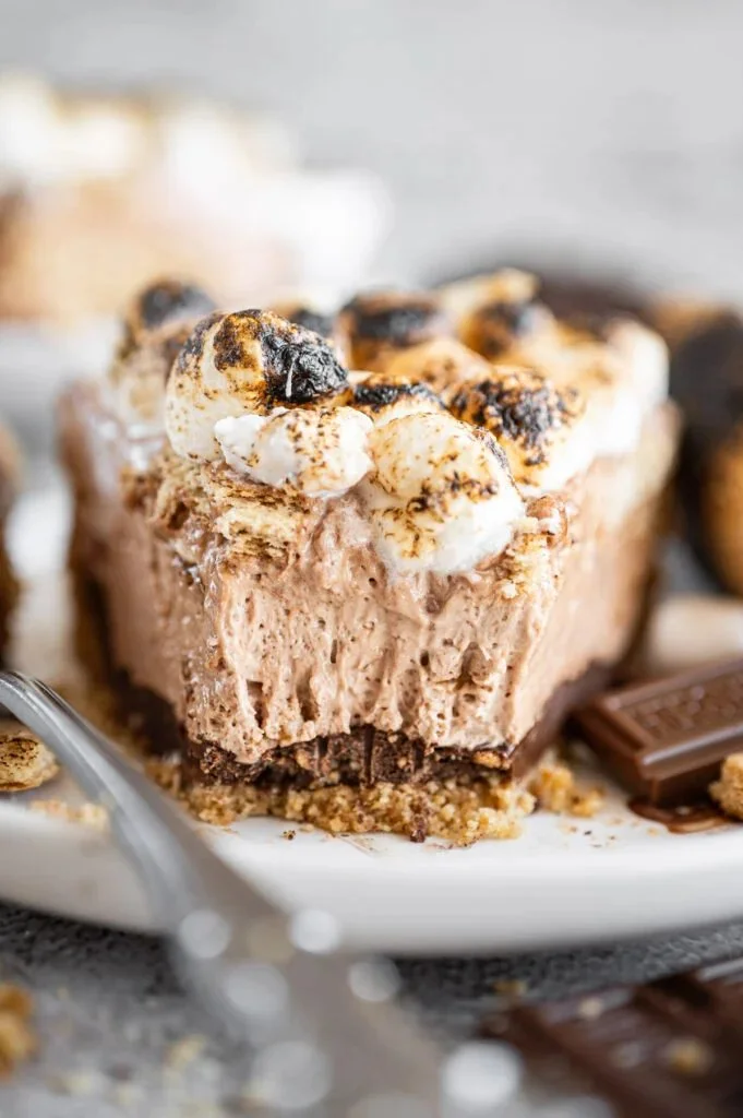 Delicious homemade S'mores Pie with gooey marshmallow and chocolate filling