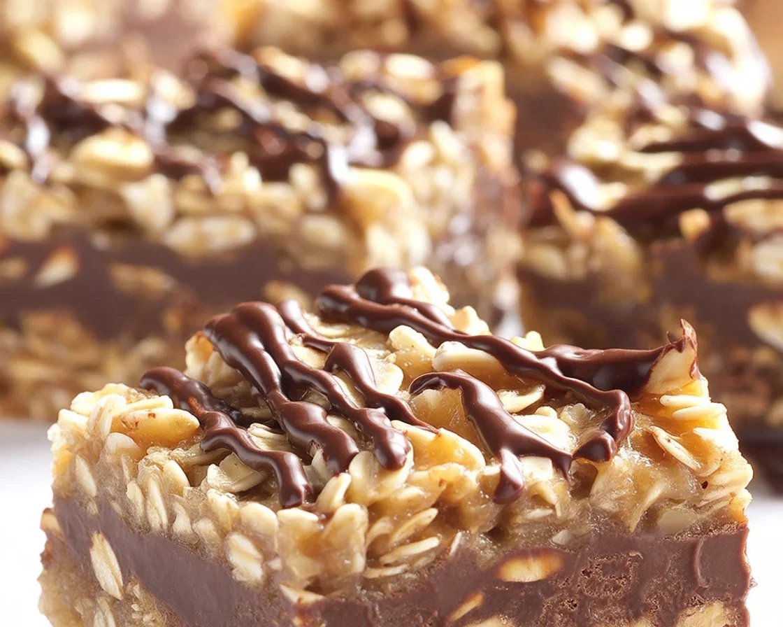 Delicious No Bake Chocolate Oatmeal Bars with chocolate and peanut butter layers.