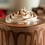 Delicious and creamy Crockpot Hot Chocolate in a slow cooker, perfect for cozy gatherings.
