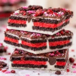 Valentine's Day Oreo Cookie Bark with Oreos, white chocolate, and colorful sprinkles.