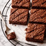 Delicious flourless Greek Yogurt Brownies, rich and fudgy, made with healthy ingredients.