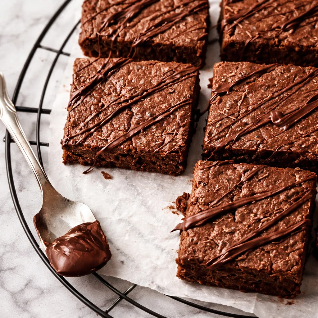 Delicious flourless Greek Yogurt Brownies, rich and fudgy, made with healthy ingredients.