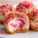 Strawberry Cheesecake Crunch Bites with a creamy filling and crunchy strawberry coating