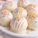 Deliciously dipped Banana Pudding Easter Truffles, showcasing banana flavor and vanilla wafers.