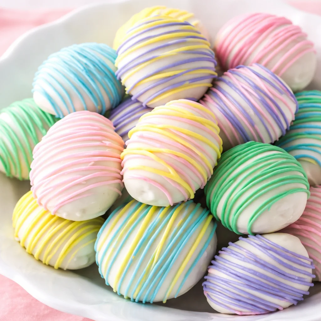 Colorful Easter Egg Oreo Balls made with Oreos and cream cheese, coated in chocolate.
