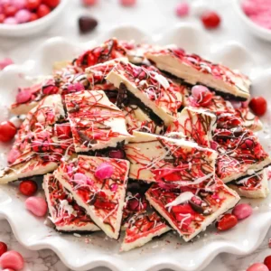 Valentine's Day Oreo Cookie Bark with Oreos and white chocolate topped with sprinkles