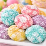 Springtime Crinkle Cookies dusted with powdered sugar, showcasing pastel colors and lemon flavor.