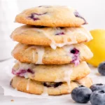Soft and chewy lemon blueberry cookies with fresh blueberries and a lemon glaze.