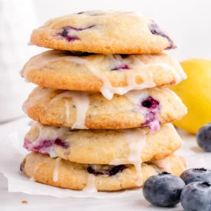 Soft and chewy lemon blueberry cookies with fresh blueberries and a lemon glaze.